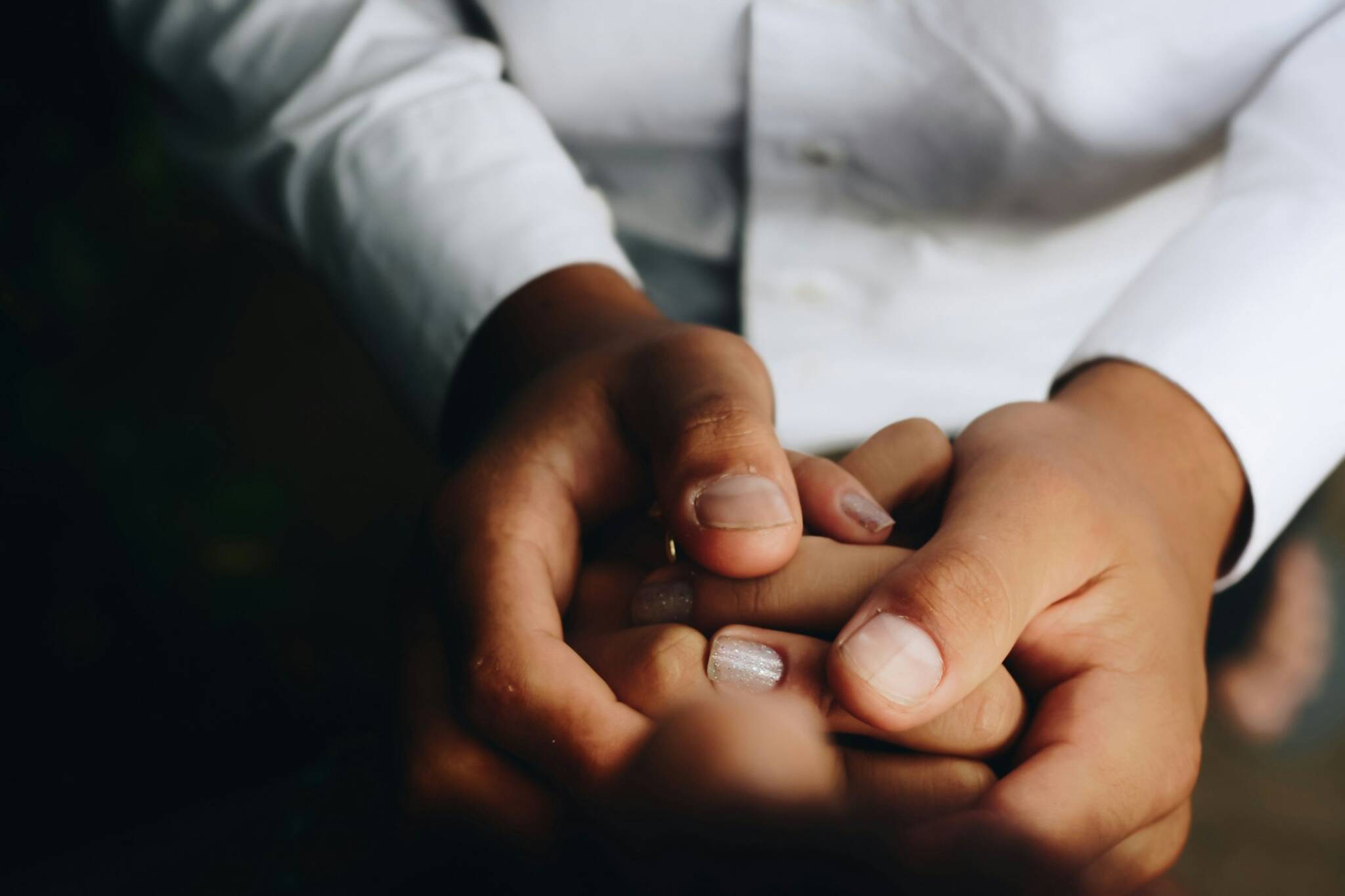Someone holding another person's hand