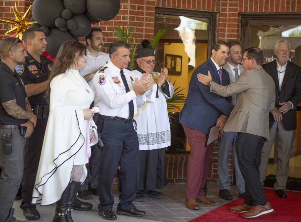 Community gathering at NOLA Detox with officials and staff.