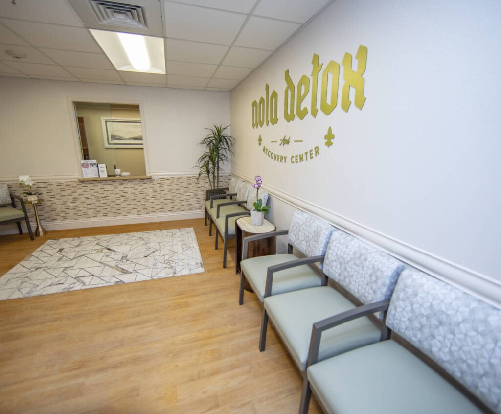 NOLA Detox recovery center waiting area with chairs and decor.