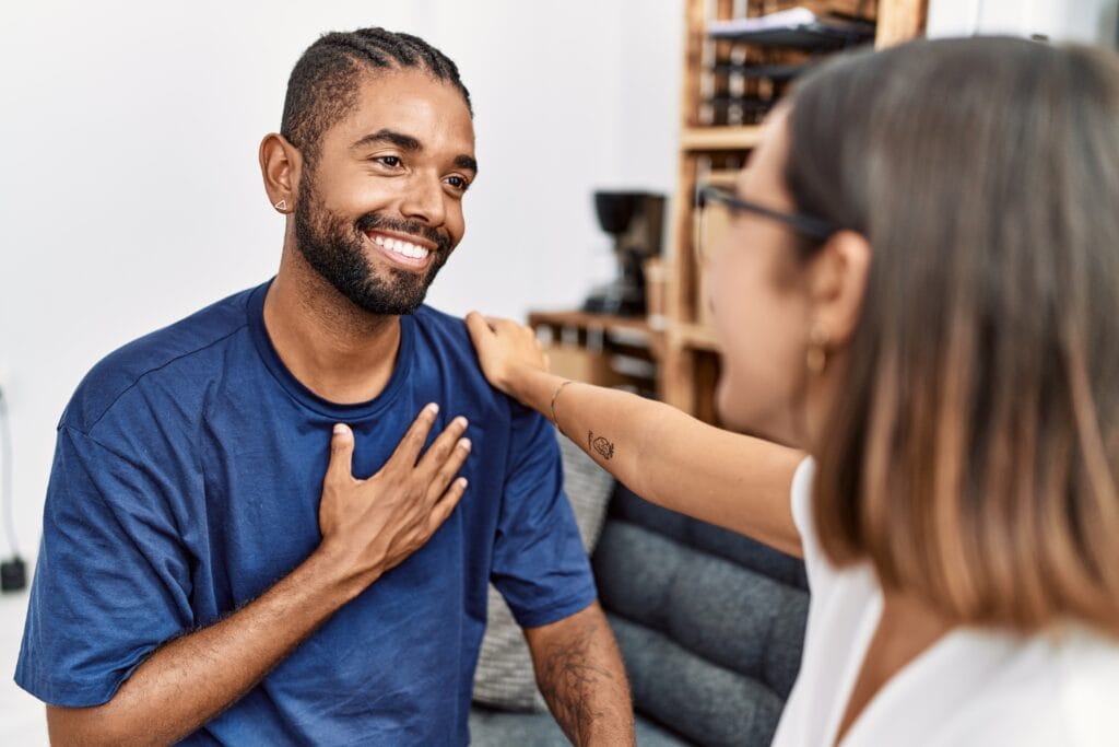 Counselor providing emotional support to a client at NOLA Detox center.